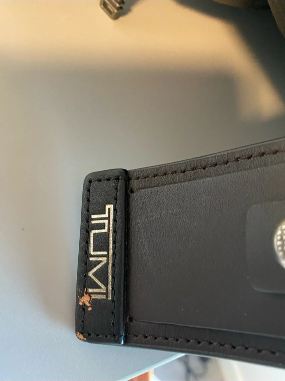 Tumi Black Leather Roll-Top Backpack with Front Pockets